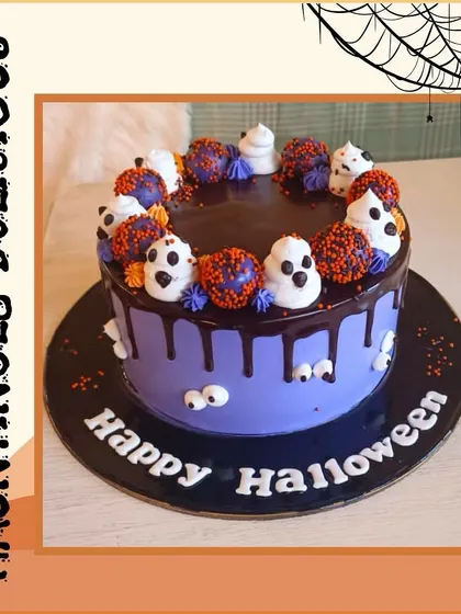 A "Hauntingly Delicious" purple Halloween cake with chocolate drip, ghost cake pops, and spooky eyes peeking out.