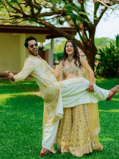 A fun, quirky pose that perfectly captures the couple's playful dynamic.
