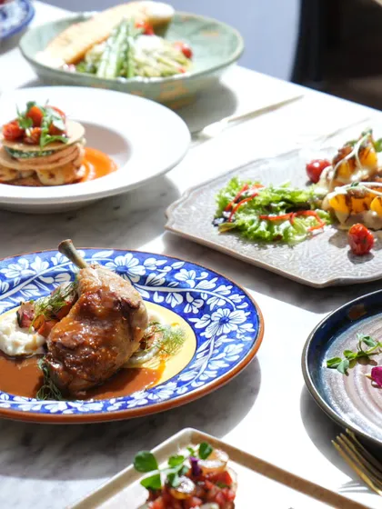 A table full of my European classics, from duck confit to potato stacks. It's a feast for the eyes and the palate.