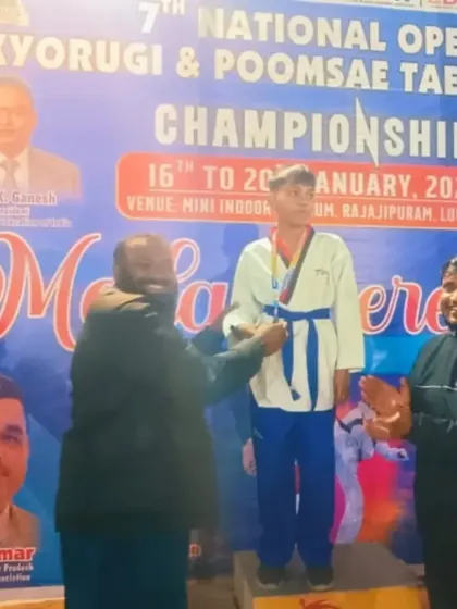 A proud moment on the podium at the 7th Open National Taekwondo Championship in Lucknow. My student Rohan is receiving his silver medal for Kyorugi.