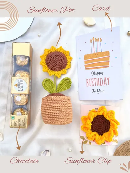 A breakdown of our cheerful Sunflower Hamper. It includes a handmade crochet sunflower pot, a matching hair clip, Ferrero Rocher chocolates, and a birthday card to complete the celebration.