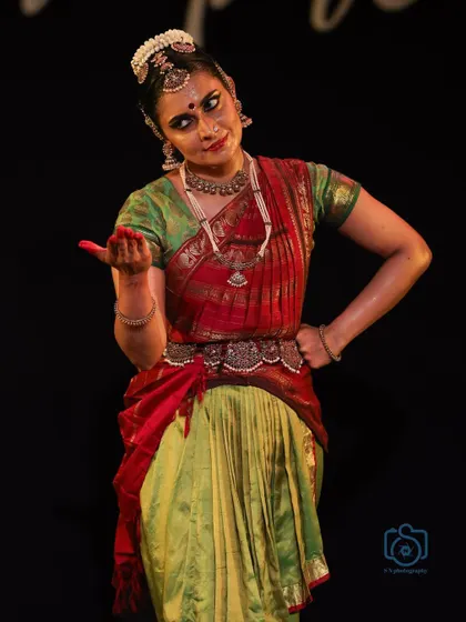 A moment of questioning and curiosity, conveyed through a simple gesture and expression.
