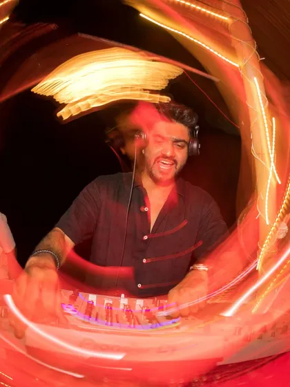 A motion-swirl photo capturing the dizzying energy of a night at Titlie, Goa. It's all about the vibe.