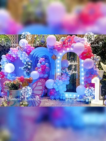 The full view of the blue and pink butterfly stage, showcasing the symmetrical design and the beautiful interplay of light and color.