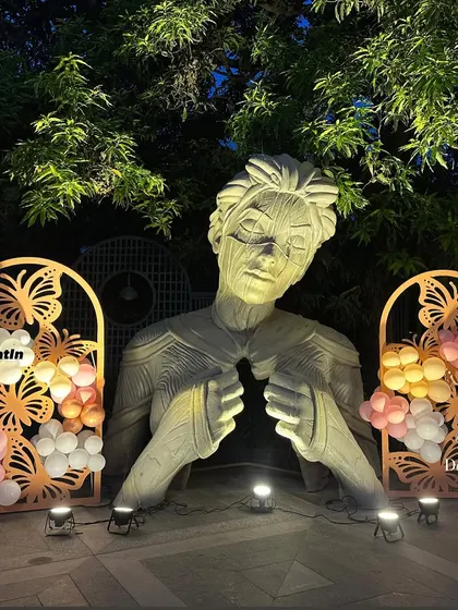 A duplicate of ID 34, showing the beautiful contrast between the natural greenery and the warm party lights.