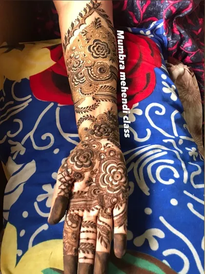 A detailed design covering the back of the hand, perfect for any party or event.