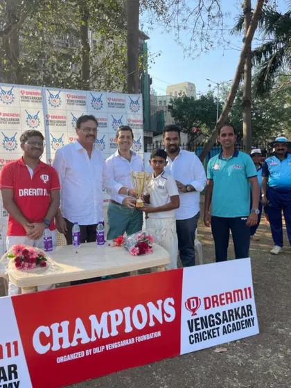 A young champion in the making, receiving his trophy at the Dream 11 Vengsarkar Cup prize distribution ceremony.