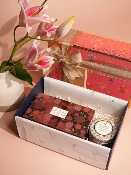 A beautifully arranged gift box featuring a mix of our floral and patterned packaging. This set, combining a reed diffuser and a tin candle, offers a delightful introduction to our fragrance world.