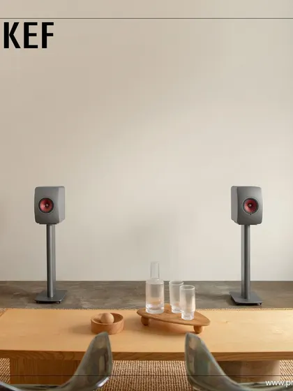 Uncompromising sound meets timeless design. These KEF speakers, set up in a modern living space, redefine luxury audio by elevating the listening experience with precision engineering and pure acoustic bliss.