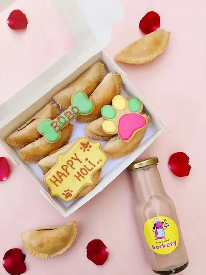 For Holi, I bake these special dog-safe gujiyas and even make a pet-friendly thandai. Now your pup can enjoy the festival of colors with their very own traditional treats, all made with safe, healthy ingredients.