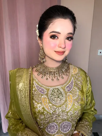 A classic portrait of the finished look, radiating a fresh and natural glow.