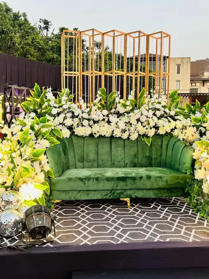 Another perspective of the elegant green and white photo stage.