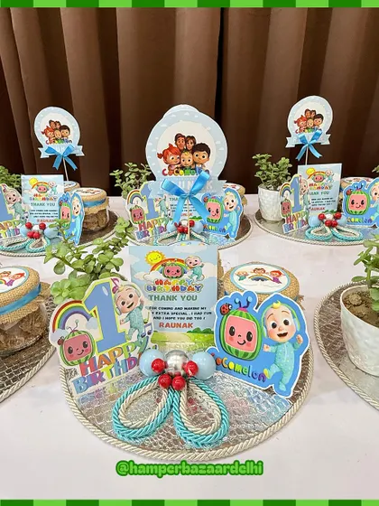 These Cocomelon hampers are arranged on silver trays, making for a beautiful and budget-friendly return gift option.