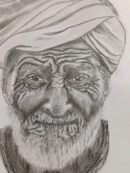Further progress on the same portrait, where the beard and clothing are beginning to take shape. This demonstrates how we work on different elements of the portrait in stages.