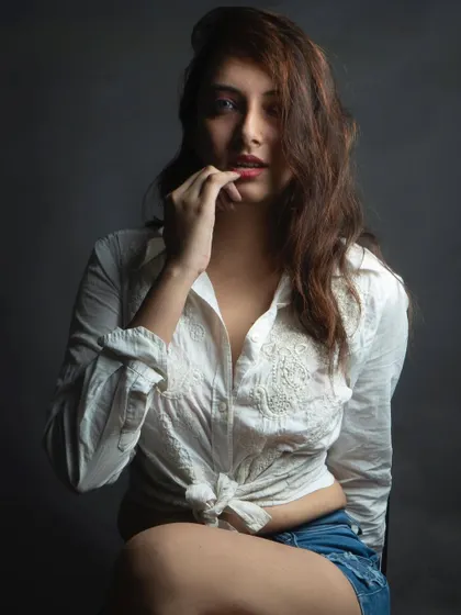 Another shot from a model's test shoot, focusing on a more intimate and expressive pose. This kind of shot adds depth and personality to a portfolio.