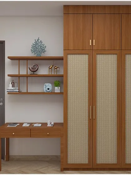 A custom wardrobe with an attached study table, featuring a rattan-inspired finish for a warm, traditional look with a modern, space-saving twist.