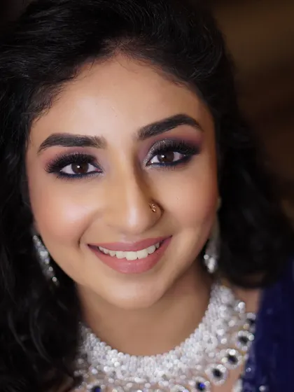 Explore more of my glamorous reception looks, featuring a variety of shimmering eye makeup, flawless finishes, and styles perfect for celebrating in the evening.
