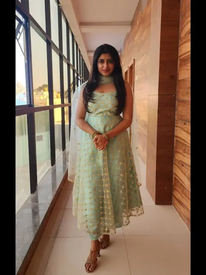 A light, pastel green anarkali. This is a great option for daytime events or pre-wedding functions.