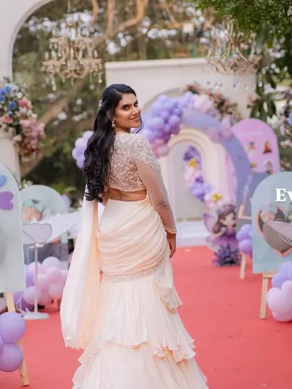 Welcome to a real-life fairyland. For Varnnika's first birthday, I created this magical entrance walkway lined with adorable photos of her first year, leading guests into a world of pastel rainbows and princess dreams.
