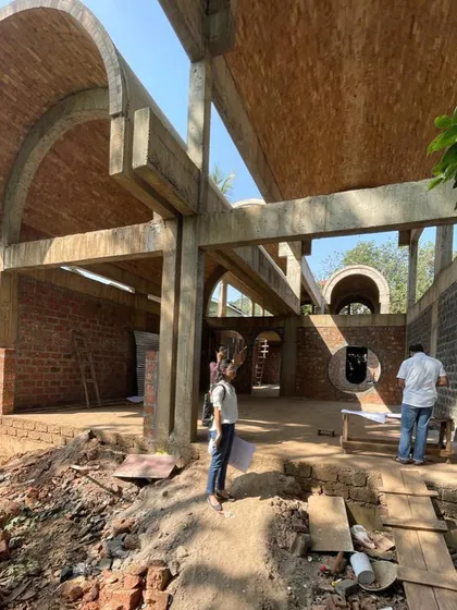 The House of Verses, seen here under construction, is a story of arches, vaults, and bricks. These site photos capture the raw, poetic beauty of the structure as it takes shape, revealing the interplay of light, shadow, and form.