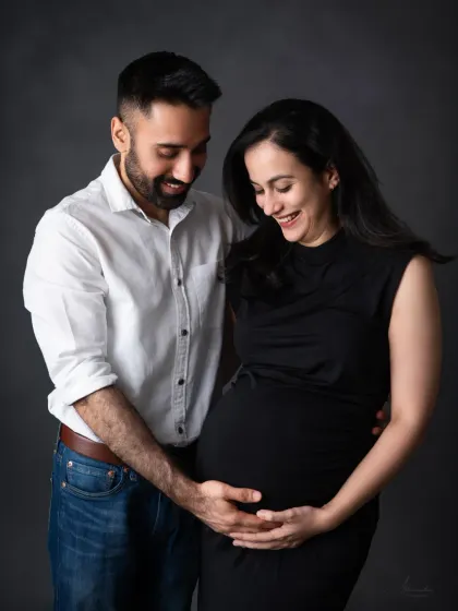 Another beautiful, candid moment. We love capturing the genuine laughter and connection that happens during our sessions.