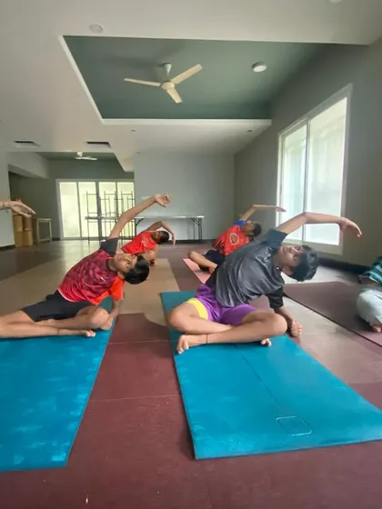 In our kids' yoga classes, we explore different seated stretches to improve flexibility in the hips and spine. These poses are introduced through stories and games, making learning fun and engaging.