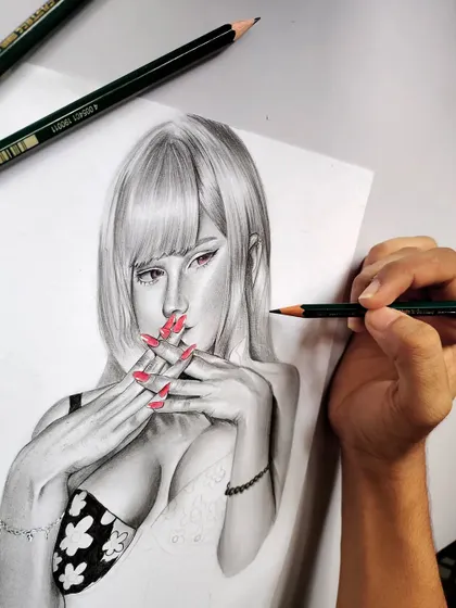 A close-up video of me adding color to the nails on the Kitagawa drawing. This shows the precision required when blending graphite with colored pencils.