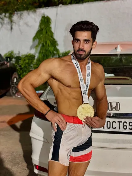 After the show, holding the medal. The feeling of accomplishment is unmatched.