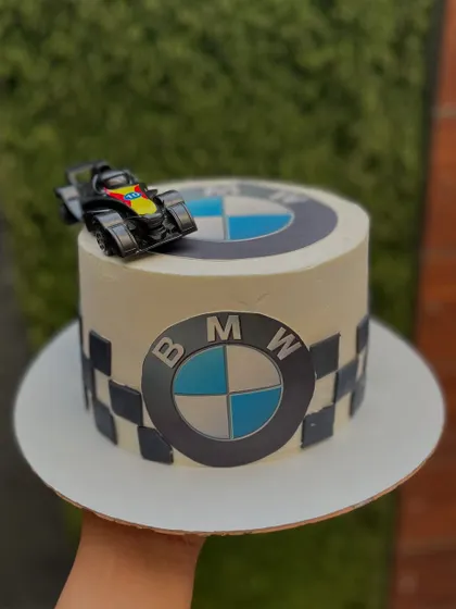 For the motor fanatic in your life. This custom BMW-themed cake, in our popular Roasted Almond Caramel flavor, shows how we can tailor a design to any passion or hobby.