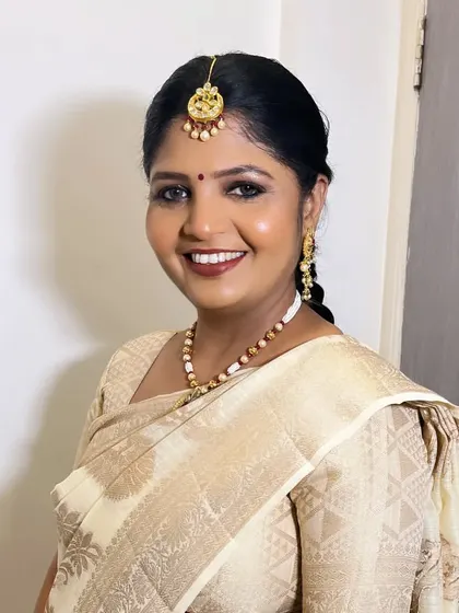Another portrait of this elegant client, her smile radiating warmth and happiness.