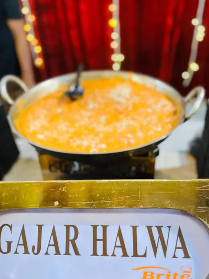 A close-up of the rich and delicious Gajar Halwa, slow-cooked with carrots, milk, and sugar.