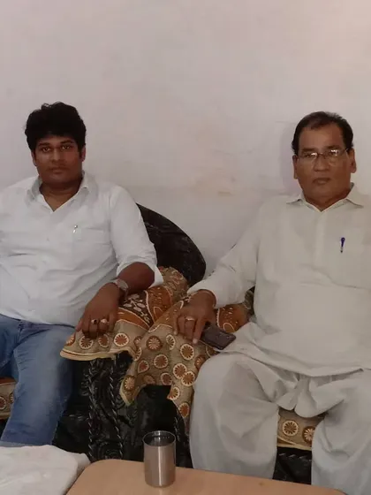 Meeting with clients and their family members helps me understand the complete situation. Here, I am discussing a case with a client and his father to prepare our legal strategy.