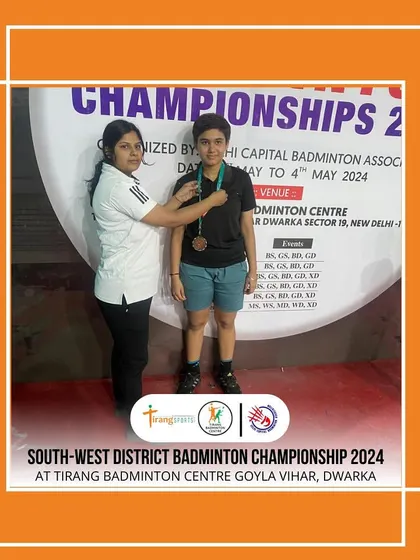 A player receives her medal at the South West District Badminton Championship. Hosting such prestigious events allows us to contribute to the growth of badminton in Delhi.