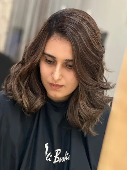 A beautiful transformation to a soft, dimensional brunette look.