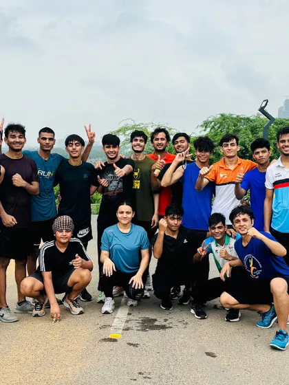 A fun group photo after a "Crazy Saturday" workout. We believe in balancing hard work with rest and recreation, ending the week on a high note.