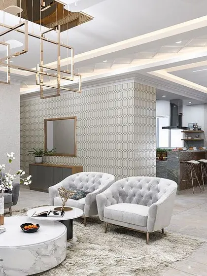 A 3D render of a neo-classical living and dining room, featuring tufted grey sofas, elegant white accent chairs, and modern chandeliers. This visualization showcases a luxurious and cohesive design concept.