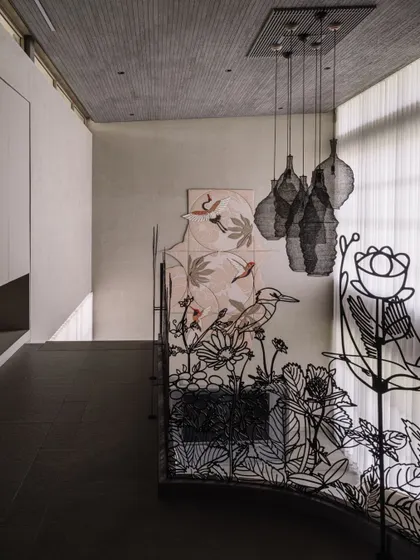 We turned a simple staircase railing into a functional sculpture telling a story of Ahmedabad's seasonal blooms. This intricate, laser-cut mild steel installation shows how even the most practical elements can become beautiful, narrative art.
