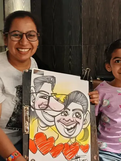 A mother and daughter with their couple caricature. It's a lovely way to capture a family bond.