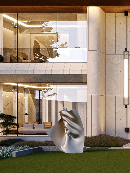 Every detail in this composition serves a purpose: framing the landscape, drawing in light, and grounding the sculpture. The facade evokes a sense of contemporary aesthetics, with clean lines and expansive glass features.