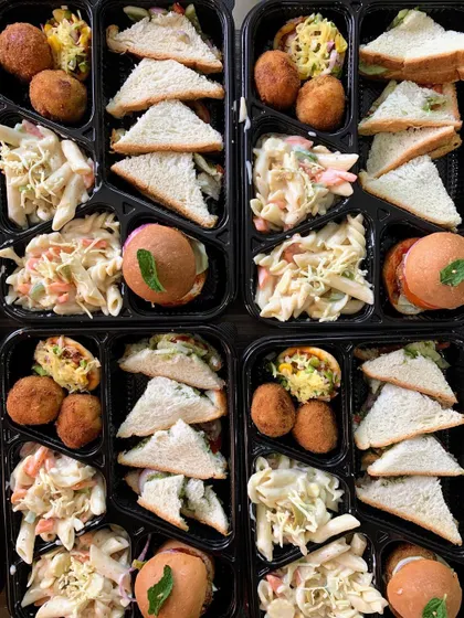 A closer look at the variety-packed meal boxes for a movie party.