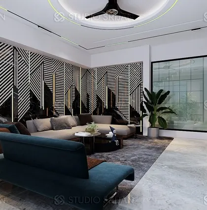 A bold and graphic living area in the Alameda residence, with a striking black-and-white patterned wall that serves as a dramatic backdrop.