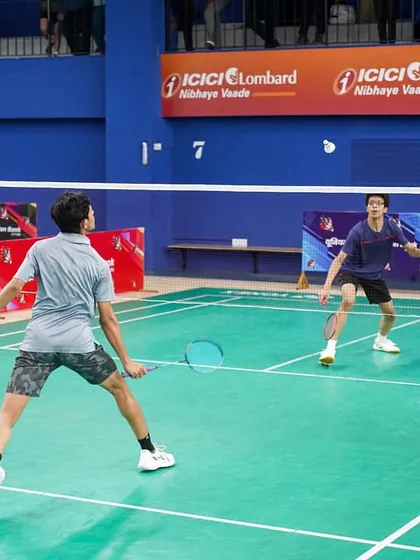 A doubles match in progress during a senior national ranking event. Our courts are set up for all formats of play, including high-paced doubles rallies.