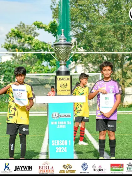 The captains with the trophy before the U13 MDL Final kickoff.