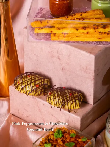 A modern Indian sweet: Pink Peppercorn & Chocolate Coconut Barfi. The subtle spice of the peppercorn cuts through the richness of the chocolate and coconut.