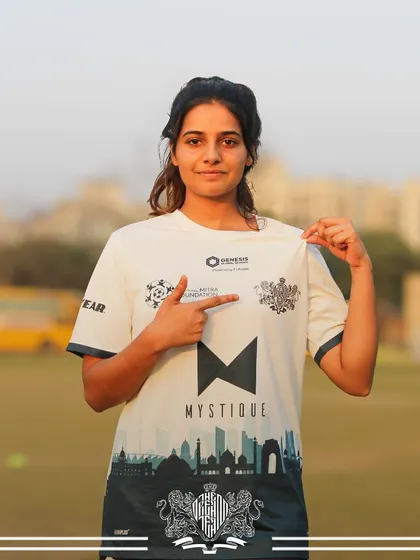 This player proudly points to the team crest, a gesture of loyalty and pride in being part of The Dream Team family.