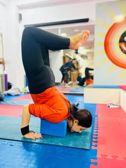 A solid forearm stand practice using a block for stability. This is an excellent preparation for lifting into Scorpion Pose and other challenging backbends.