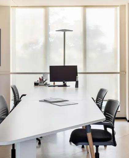A meeting area in our studio, where ample daylight creates an ideal environment for discussions and presentations. The minimalist design ensures that the focus remains on the creative work at hand.