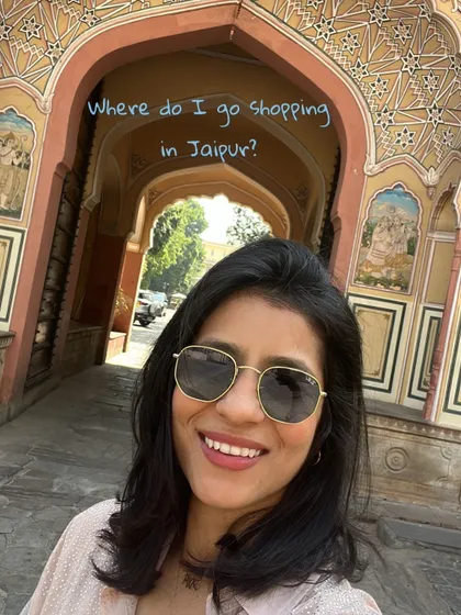 A common question I get is "Where do I shop in Jaipur?" This post is your ultimate guide. Here I am at the iconic city palace, ready to take you on a shopping tour.
