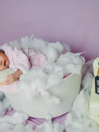 Another take on the newborn spa day, this time with a makeup palette prop for a touch of glamour.