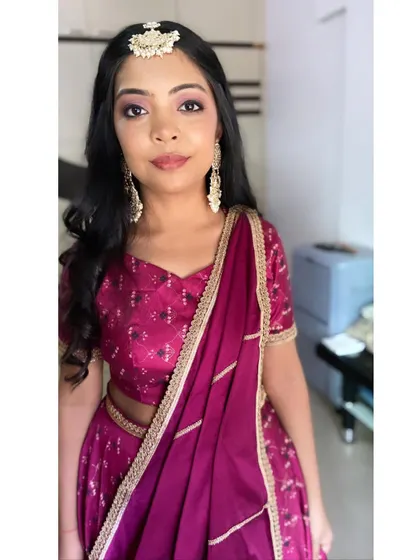 A full view of her look, showing her confidence and joy.